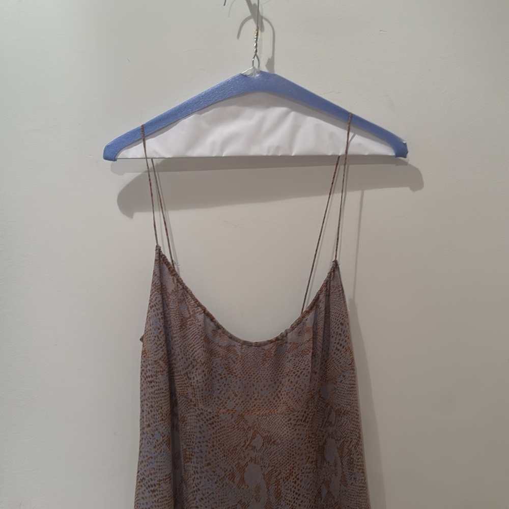 Tahari slip spaghetti strap 100% silk dress. Size 12.
NEWLY dry cleaned. - Picture 13 of 13